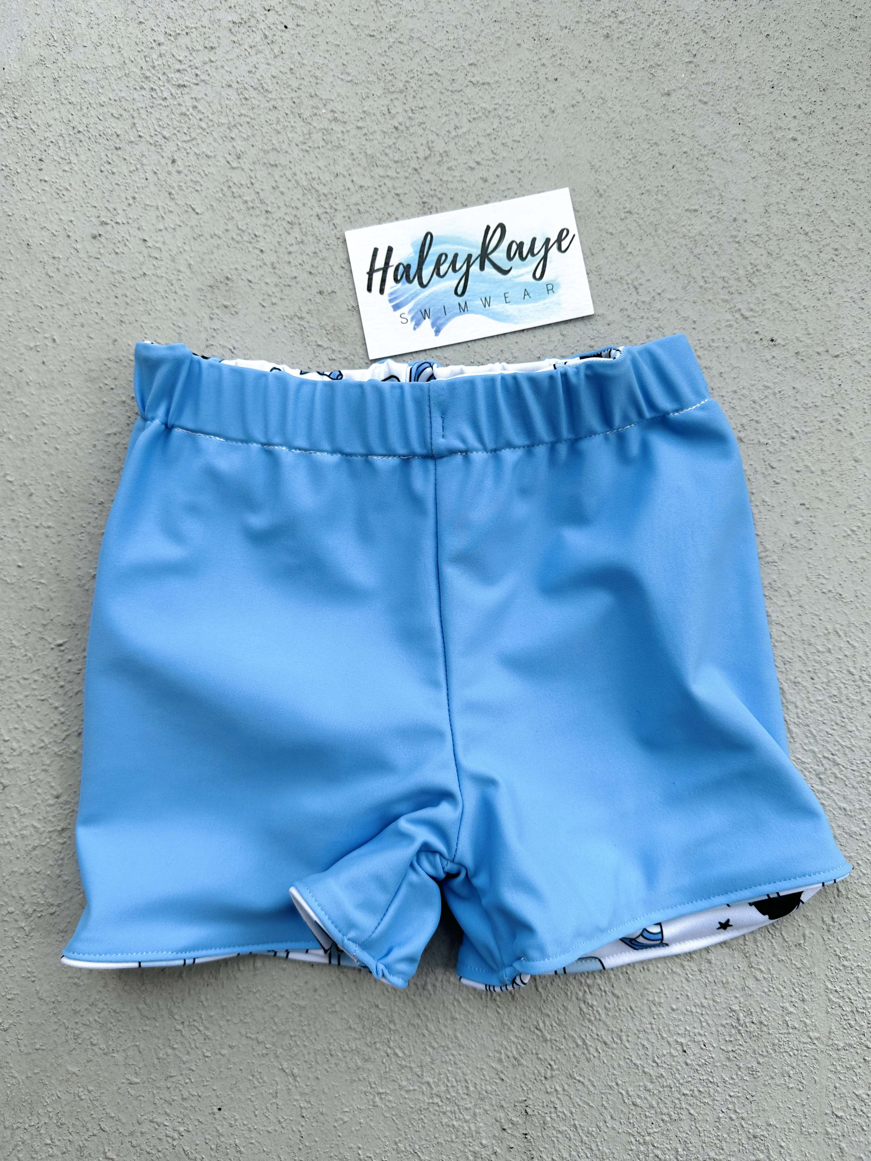 BOY SWIM SHORTS: TRUCK PRINT