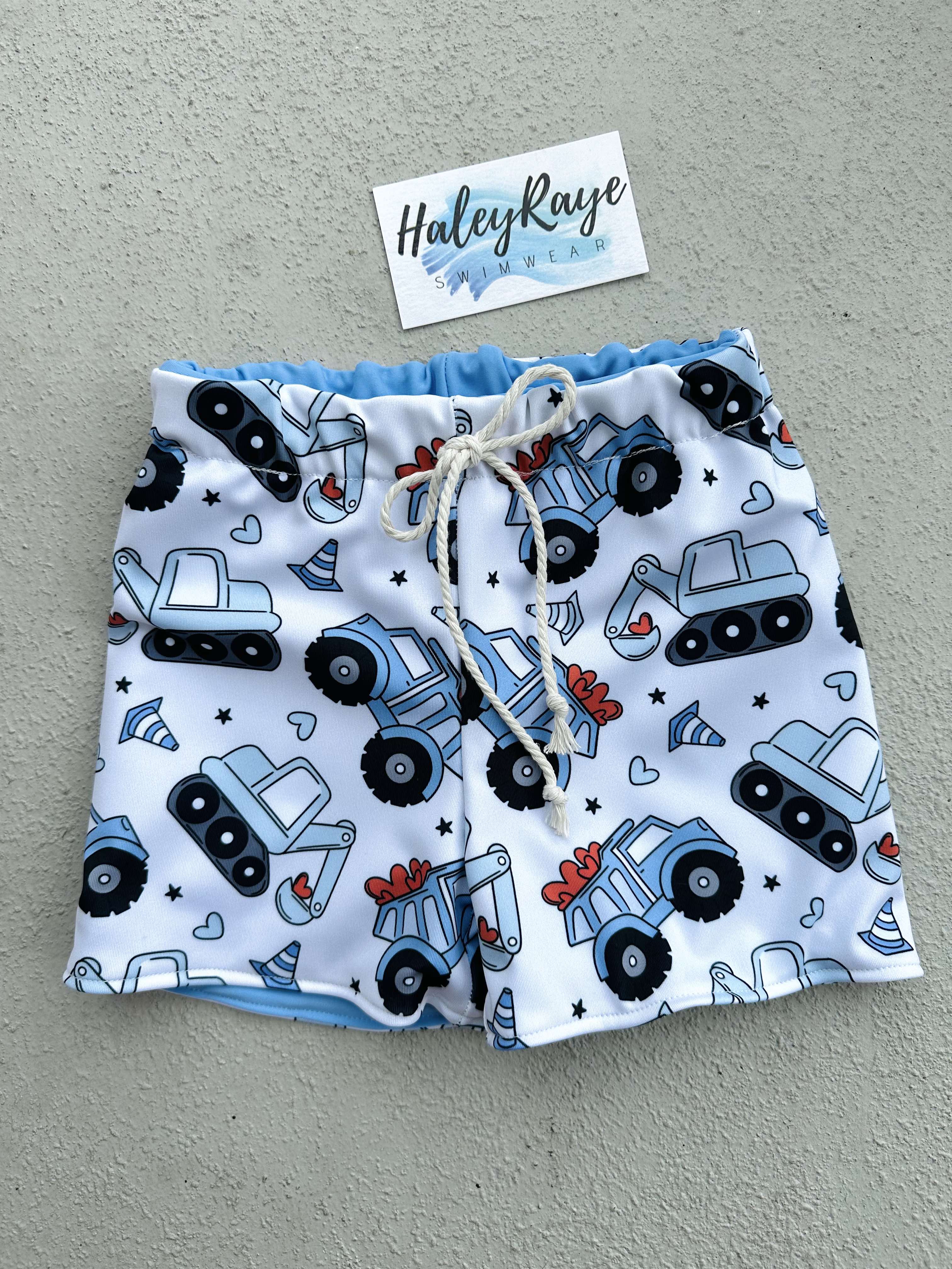 BOY SWIM SHORTS: TRUCK PRINT